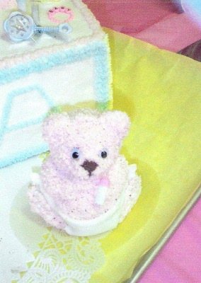 side view of baby teddy bear blocks cake
