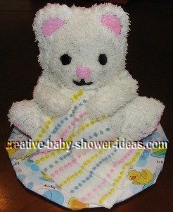 cute teddy bear baby cake with colorful blanket