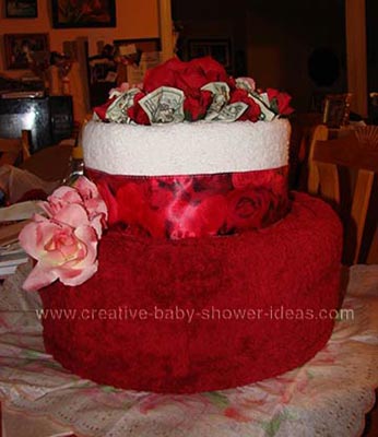 red flowers cash towel cake
