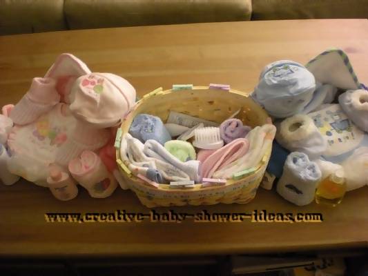 top view of towel cupcakes and baby basket