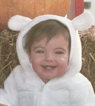 baby wearing white bunny costume