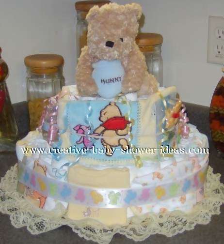 cuddly bear and blankets winnie the pooh diaper cake