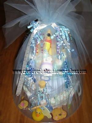 finished winnie the pooh diaper cake wrapped  in tulle