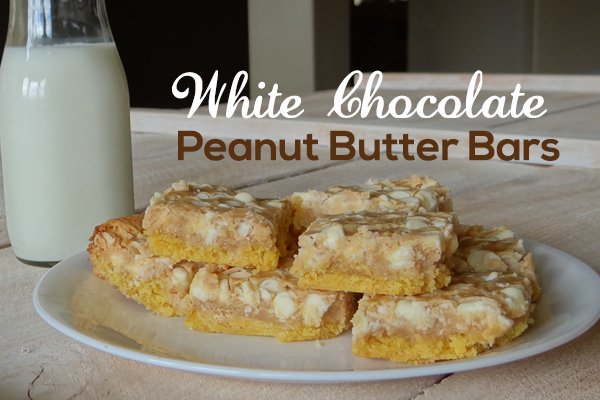 bottle of milk next to white chocolate peanut butter bars
