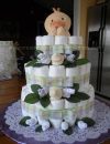 pastel sock roses and yellow duck diaper cake