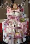 pink polka dots monkey diaper cake