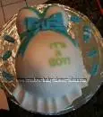 blue and green its a boy belly cake