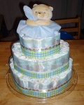 winnie the pooh and blanket diaper cake