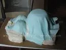 blue and white dress belly cake