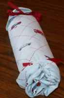 basket carriage wheel tied with ribbon