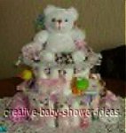 white and pink bear diaper cake