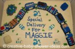 train cake that says special delivery for Maggie