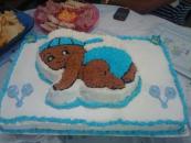 crawling baby boy with blue underwear and baseball cap cake