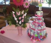 heart shaped baby sock rose bouquet with pink diaper cake
