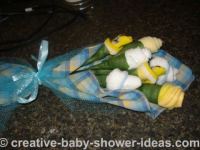 yellow and white baby sock roses