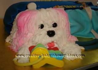 closeup up of puppy dog  and keys with juicy diaper bag cake