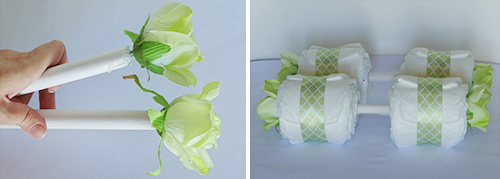blue and green diaper baby carriage with whales and stripes attaching the stroller wheels