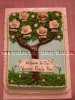 family tree cake with faces on the blossoms