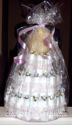 pink and white lace diaper cake