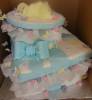 white and blue gift box baby cake