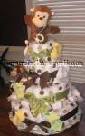 green and brown polka dots diaper cake