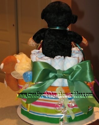 green stripes monkey diaper cake showing bow