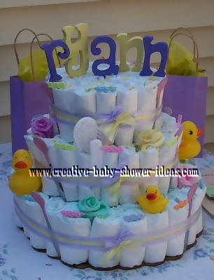 closeup of duck diaper cake on baby shower gift table