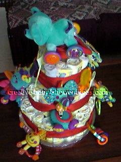 side of colorful animals diaper cake