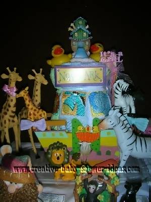 closeup of front of noahs ark diaper cake with animals