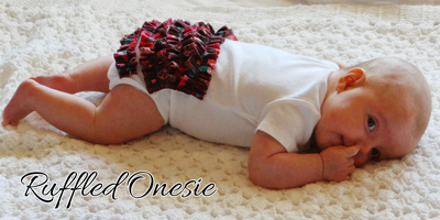 3 month old wearing ruffled onesie