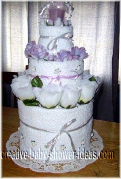 white and lavendar towel cake