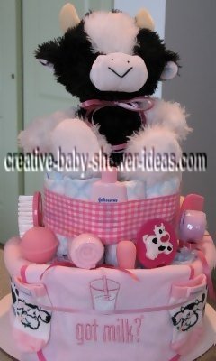 white and white got milk cow diaper cake