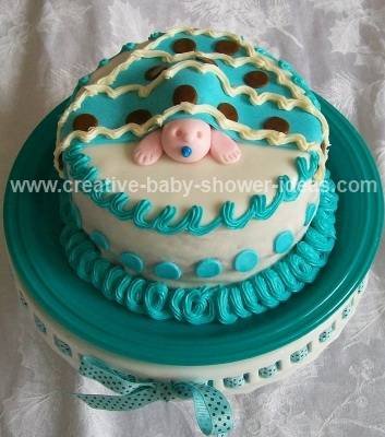teal and white boy baby blanket cake