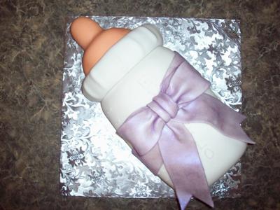 Baby bottle cake