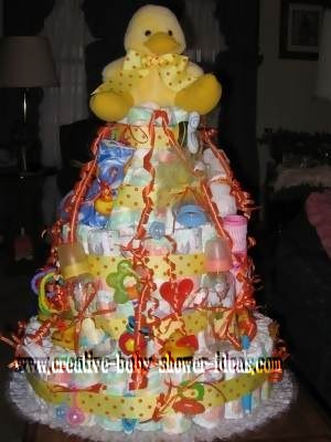 orange and yellow polka dot diaper cake