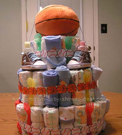 sports diaper cake with football and baseball ribbon