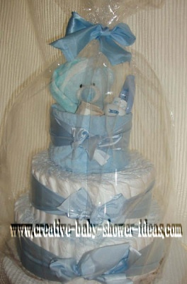 boy teddy bear diaper cake wrapped in cellophane
