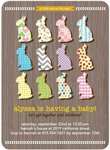 couples hugging with a heart baby shower invitation