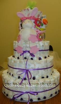 purple roses and bunny diaper cake