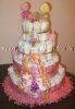 princess diaper cake with diaper towers and washcloth lollipop spires