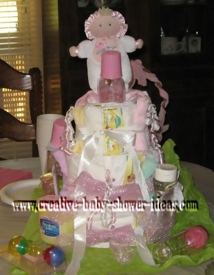 pink babies and bottles diaper cake