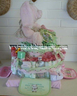 other side of pink bunny in cute floral dress on a diaper cake