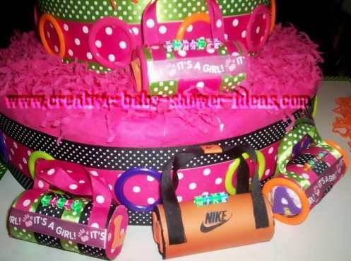 closeup of mod dots diaper cake with diaper duffle bags