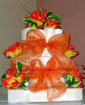 closeup of elegant orange roses diaper cake