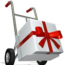 white gift with a red bow on a dolly to be delivered
