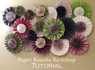 green and purple paper rosette backdrop