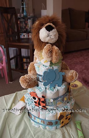 lion diaper cake with wooden animals