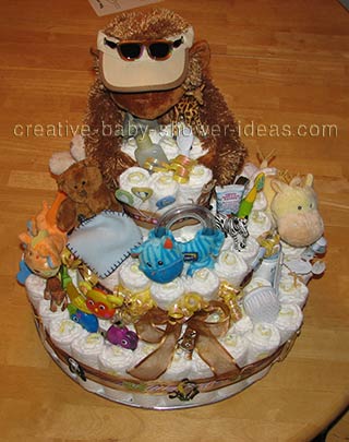 top of gorilla nappy cake with toys