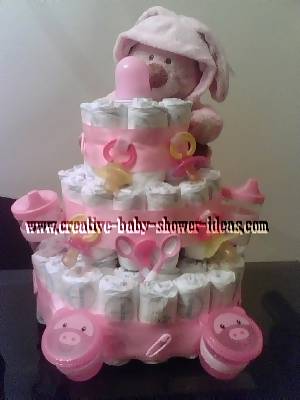 Bear Diaper Cake pink teddy bear and pacifiers diaper cake