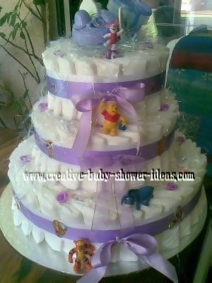 purple and white winnie the pooh diaper cake